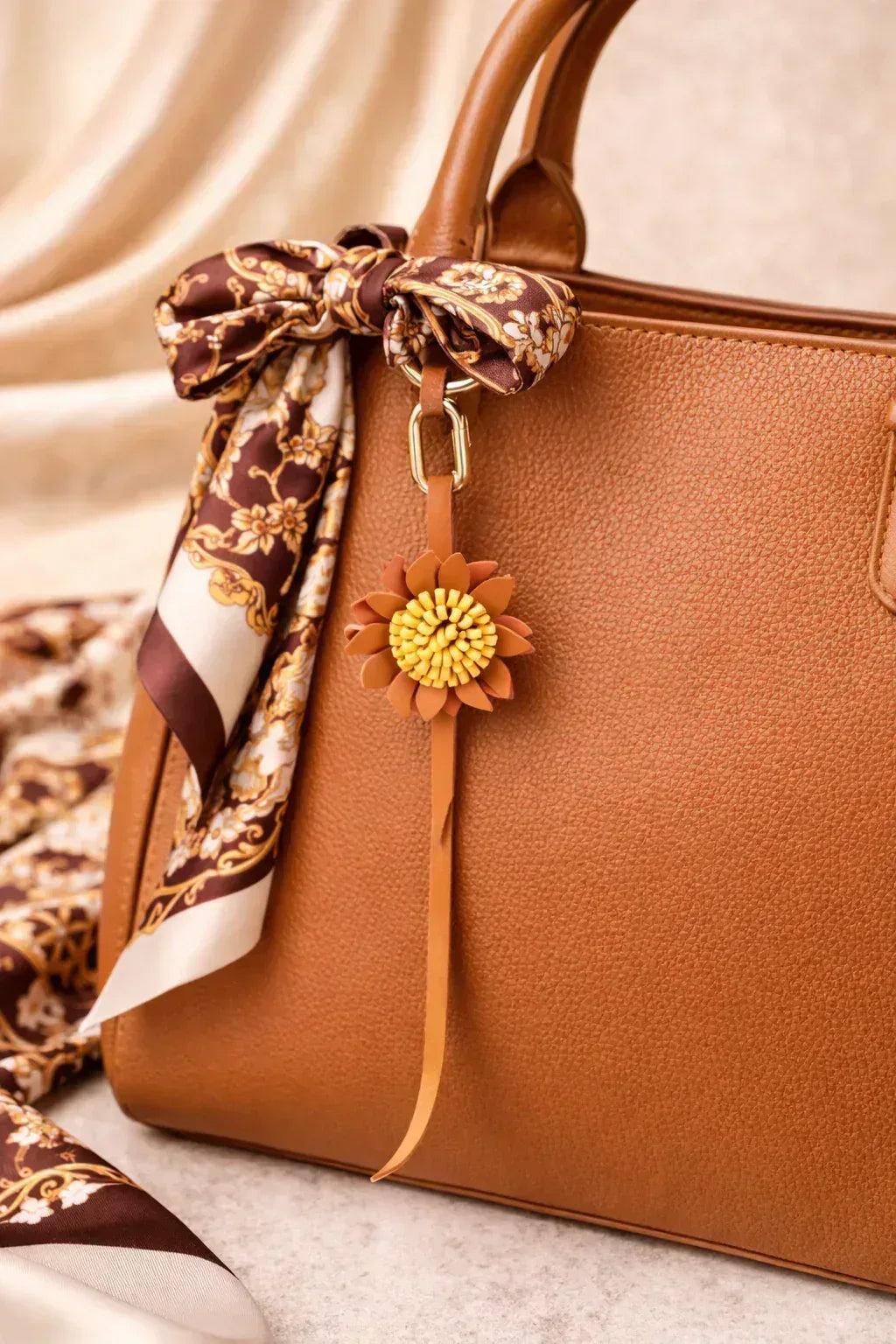 Yellow Autumn Rosette Charm on red purse with scarf. 