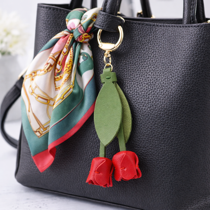 Red  Sweetheart Tulip Bag Charm with key ring on purse with scarf. 