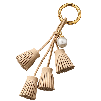 Beige Suede & Pearl Tassel Bag Charm with pearl accent on brass key ring. 