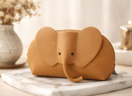 Handcrafted genuine leather elephant crossbody mini bag in brown by Trunk Love.