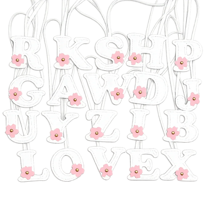 Various Initials in Bloom Alphabet Bag Charms with leather strap. 