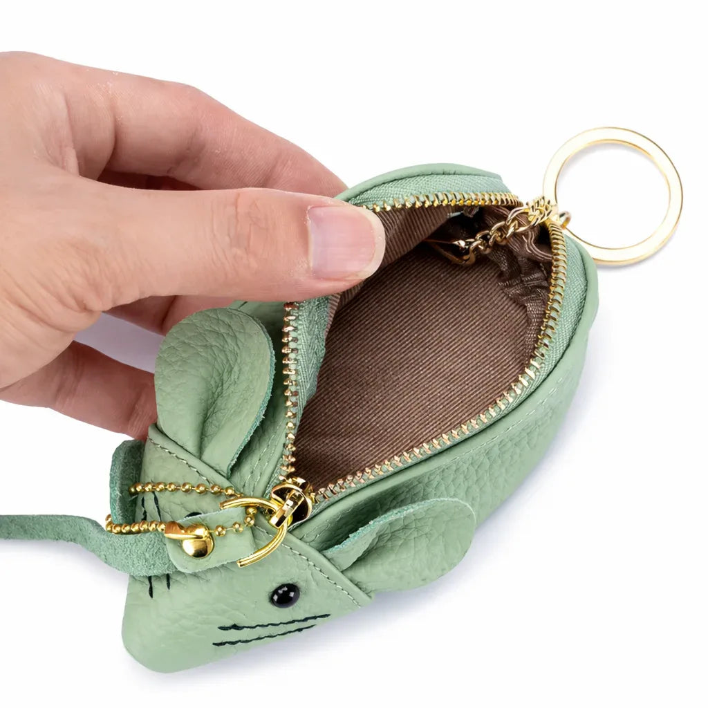 Close-up of the inside lining and sturdy silver key ring attachment on the leather mouse pouch.