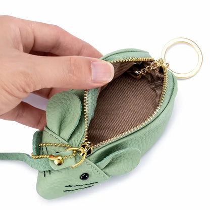 Close-up of the inside lining and sturdy silver key ring attachment on the leather mouse pouch.