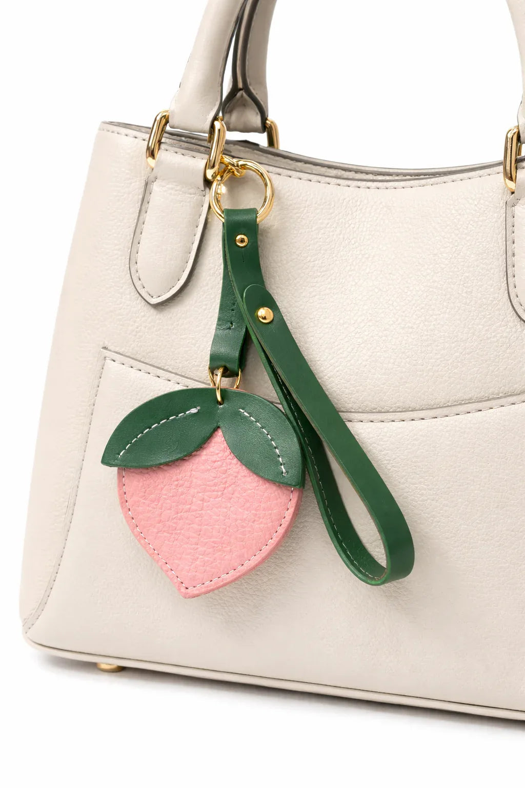 Little Orchard Peach Fruit Bag Charm with leather strap on Purse. 