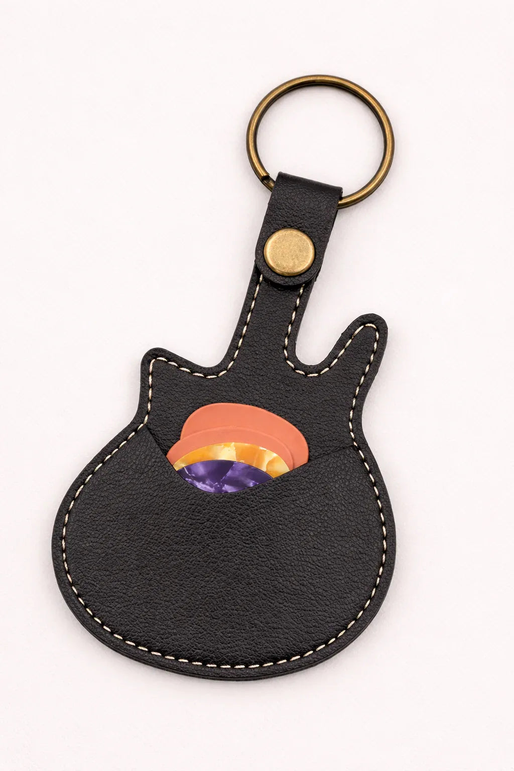 Handmade black  guitar-shaped leather keychain with a secure pick pocket and brass-tone ring.