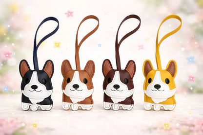 4 different colored Corgi Companions Leather Bag Charms with leather strap in a row on fun background.