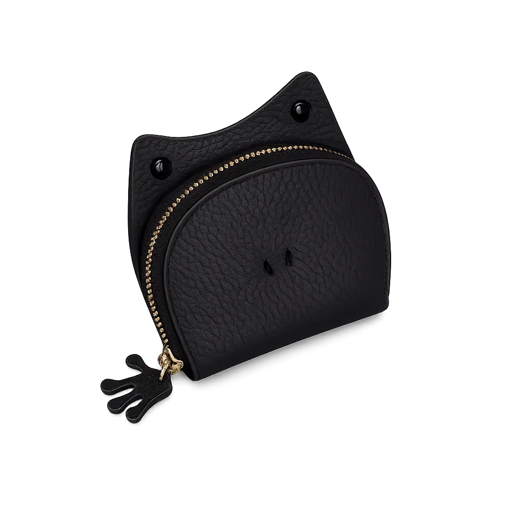 Handcrafted black leather frog-shaped card holder with a smiling face and gold zipper.