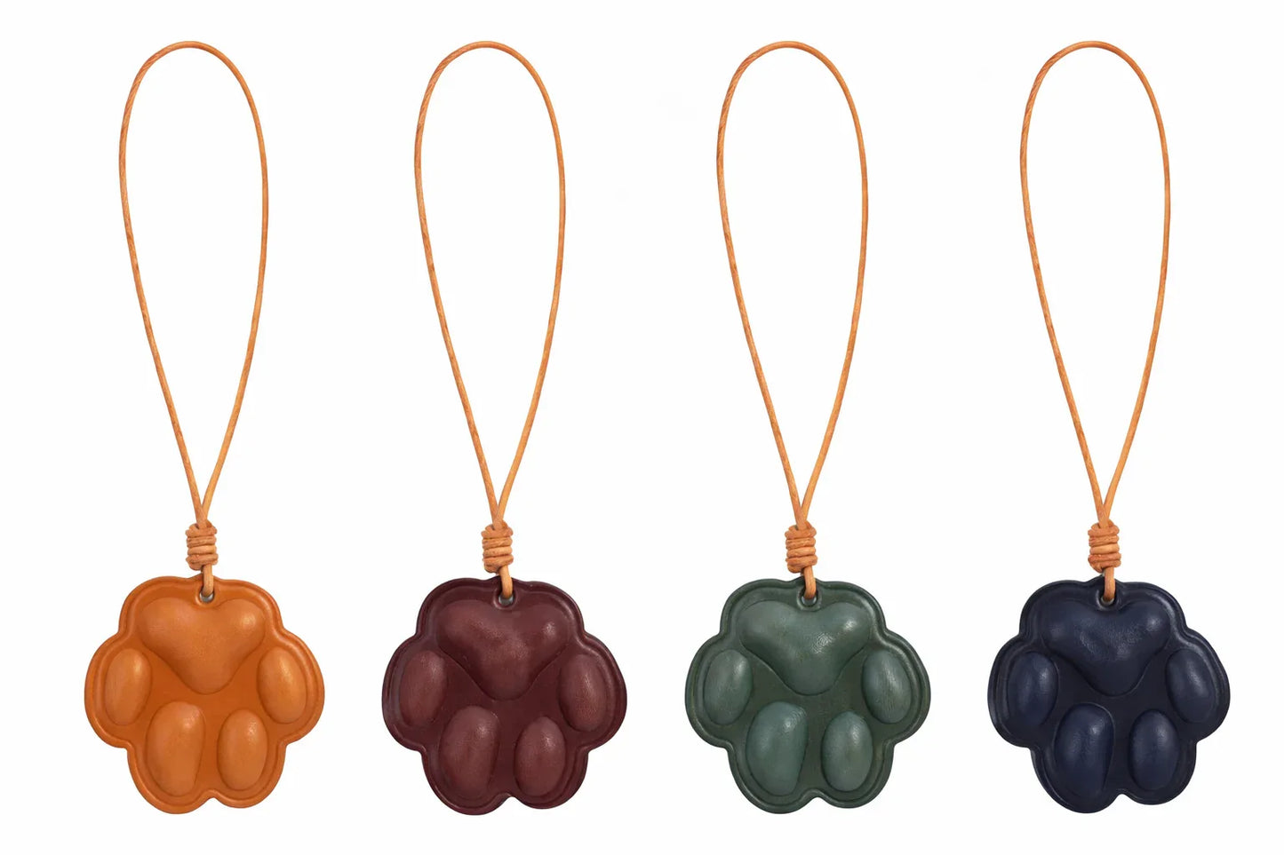 Everyday Companion 4 different colored Dog Paw Bag Charm with leather strap. 