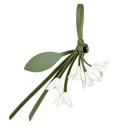 White Petite Lily Bag Charm  with leather strap. 