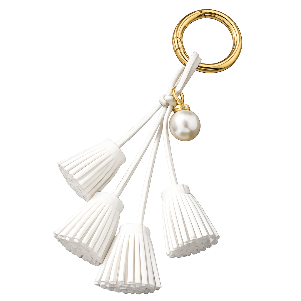 White Suede & Pearl Tassel Bag Charm with pearl accent on brass key ring. 