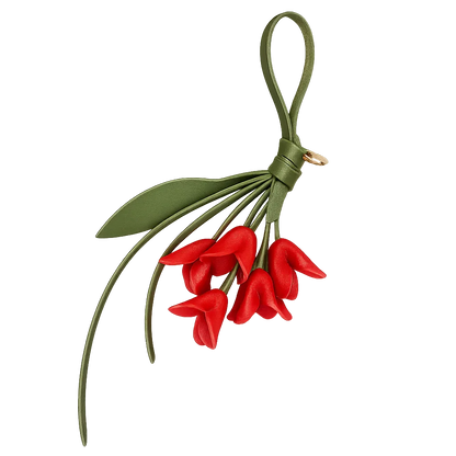 Red Petite Lily Bag Charm  with leather strap. 