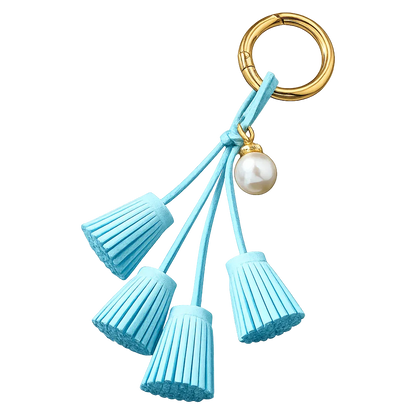 Light Blue Suede & Pearl Tassel Bag Charm with pearl accent on brass key ring. 