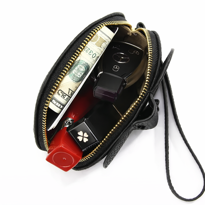 Handmade leather elephant wallet showing zipper detail, inside size and cute animal design.