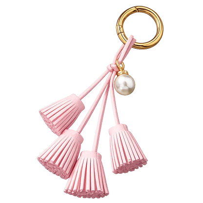 Pink Suede & Pearl Tassel Bag Charm with pearl accent on brass key ring. 