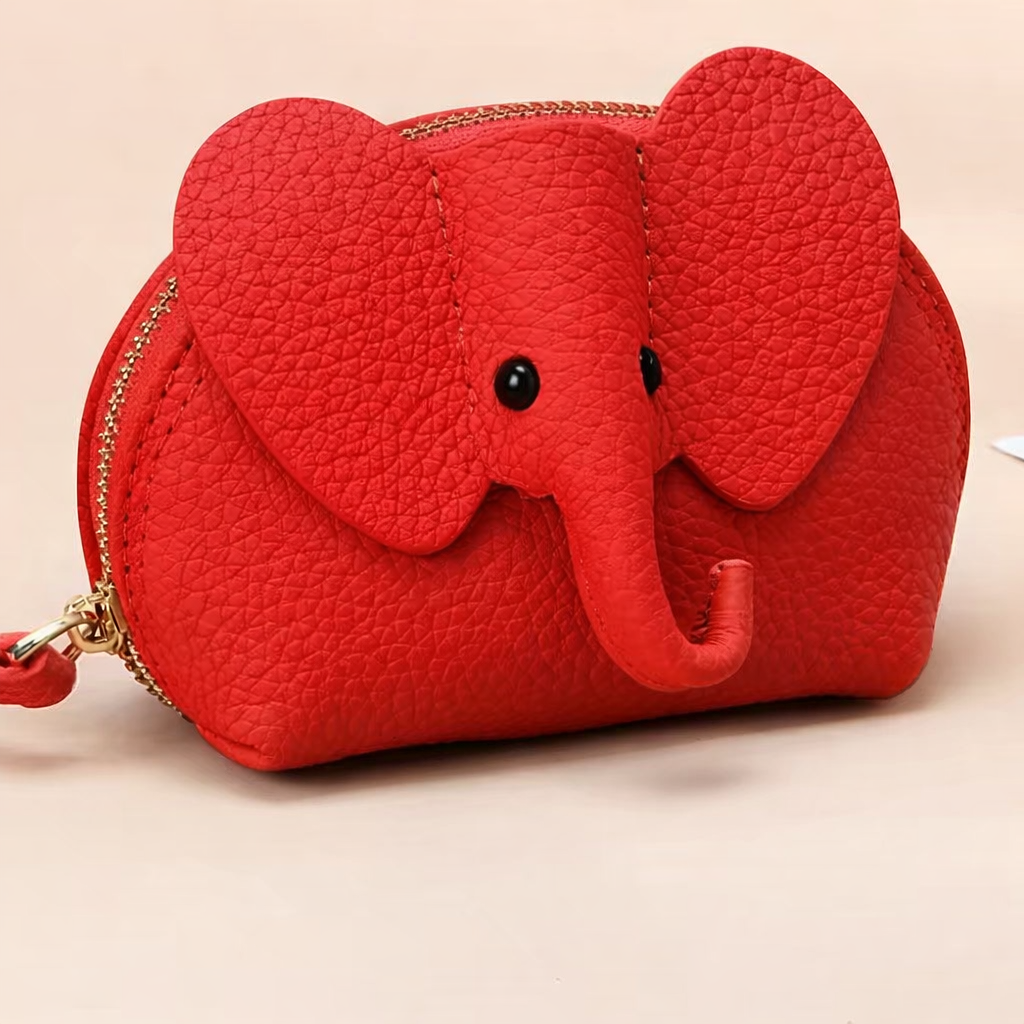 Baby Elephants on Parade genuine leather elephant-shaped coin pouch in Red.