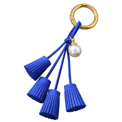 Blue Suede & Pearl Tassel Bag Charm with pearl accent on brass key ring. 