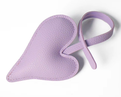Lavender  Carry Your Heart Collection Leather Heart Bag Charm on white background. 