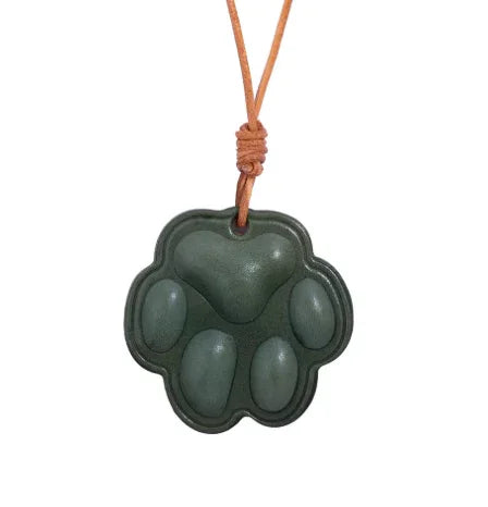 Everyday Companion Green Dog Paw Bag Charm  with leather strap. 