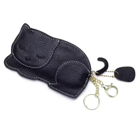 Catnap Cuties sleeping cat leather coin purse in Black with a zipper closure with tail.
