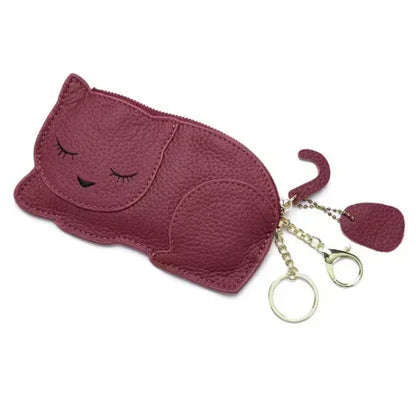 Catnap Cuties sleeping cat leather coin purse in Red with a zipper closure with tail.