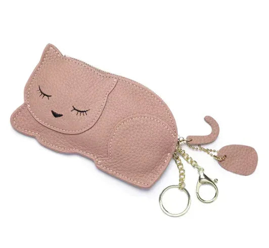 Catnap Cuties sleeping cat leather coin purse in Pink with a zipper closure with tail.