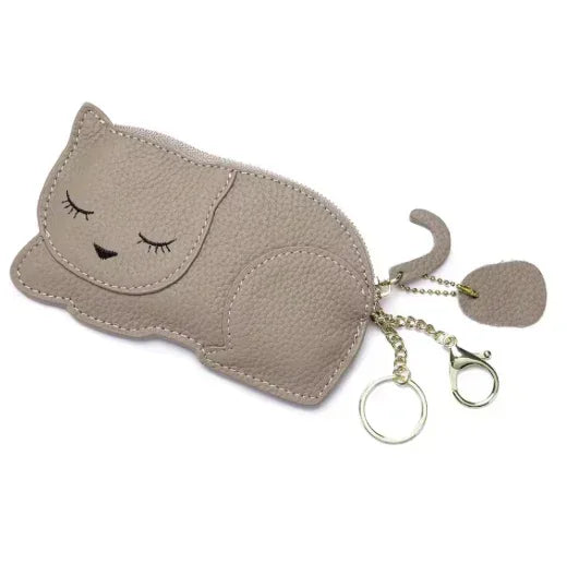 Catnap Cuties sleeping cat leather coin purse in Tan with a zipper closure with tail.