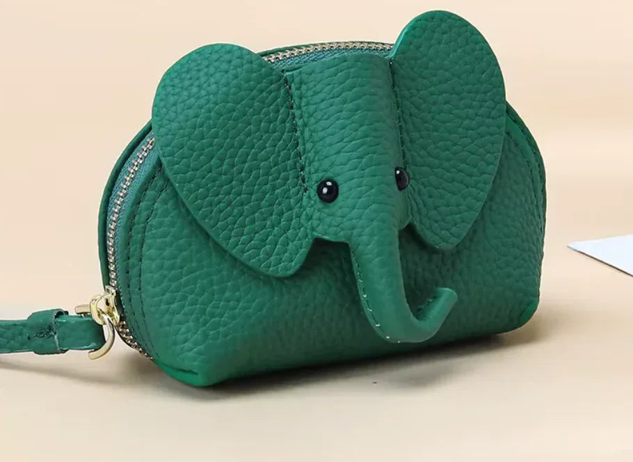 Baby Elephants on Parade genuine leather elephant-shaped coin pouch in Green.