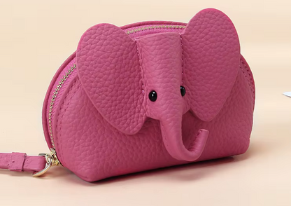 Baby Elephants on Parade genuine leather elephant-shaped coin pouch in Pink.