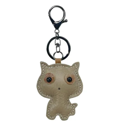 Brown handmade leather cat keychain with a minimalist silhouette and silver metal key ring.