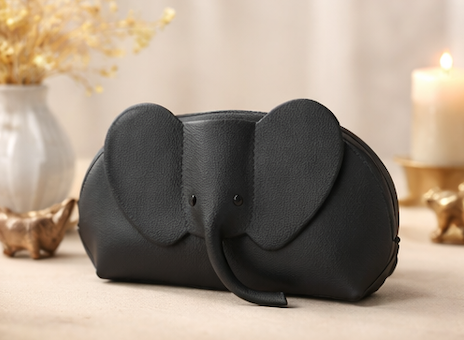 Handcrafted genuine leather elephant crossbody mini bag in black by Trunk Love.