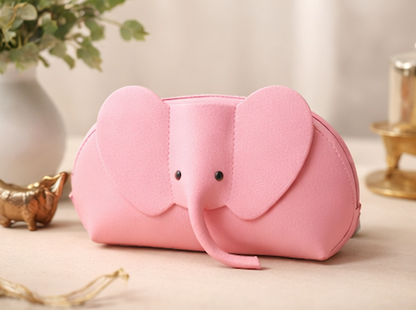 Handcrafted genuine leather elephant crossbody mini bag in pink by Trunk Love.