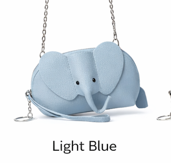 Handcrafted genuine leather elephant crossbody mini bag in light blue by Trunk Love.