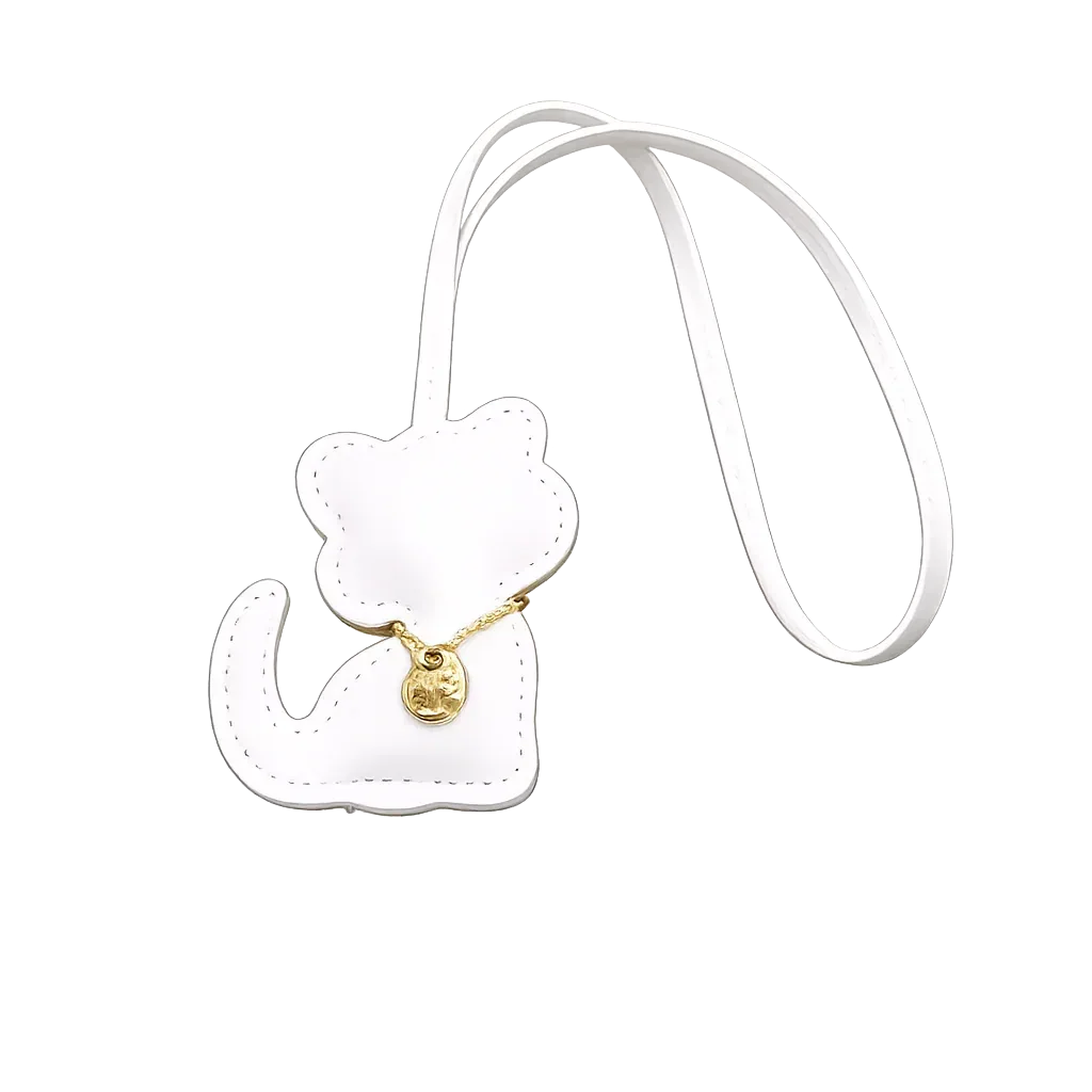 White Cozy Kitty Handmade Leather Kitten Bag Charm with leather strap.