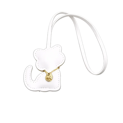 White Cozy Kitty Handmade Leather Kitten Bag Charm with leather strap.