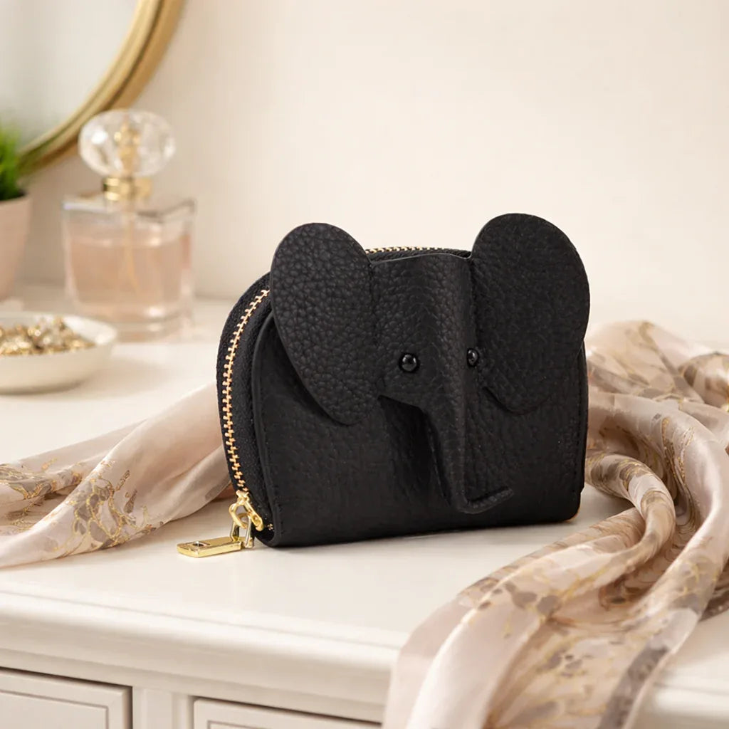 Elephant-shaped leather card holder in Black with a secure gold zipper and multiple card slots.