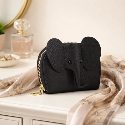 Elephant-shaped leather card holder in Black with a secure gold zipper and multiple card slots.