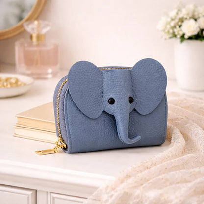 Elephant-shaped leather card holder in Blue with a secure gold zipper and multiple card slots.