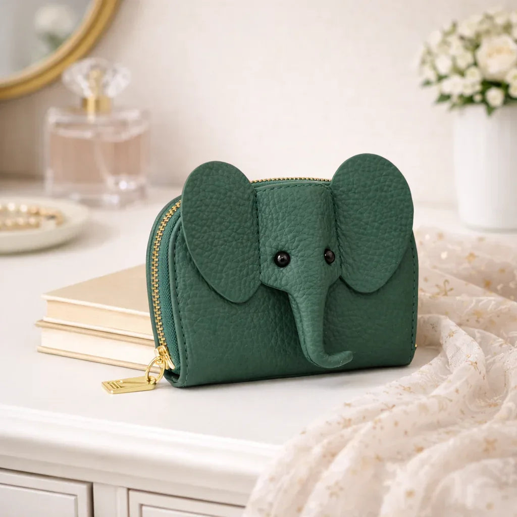 Elephant-shaped leather card holder in Green with a secure gold zipper and multiple card slots.