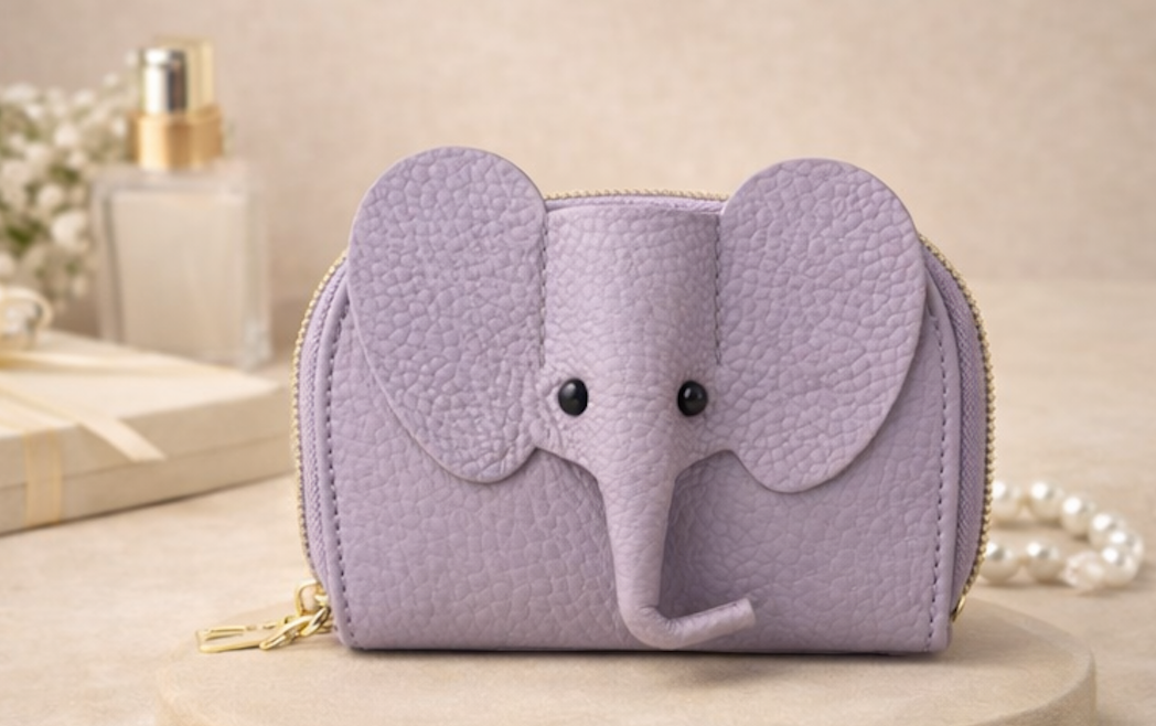 Elephant-shaped leather card holder in Purple with a secure gold zipper and multiple card slots